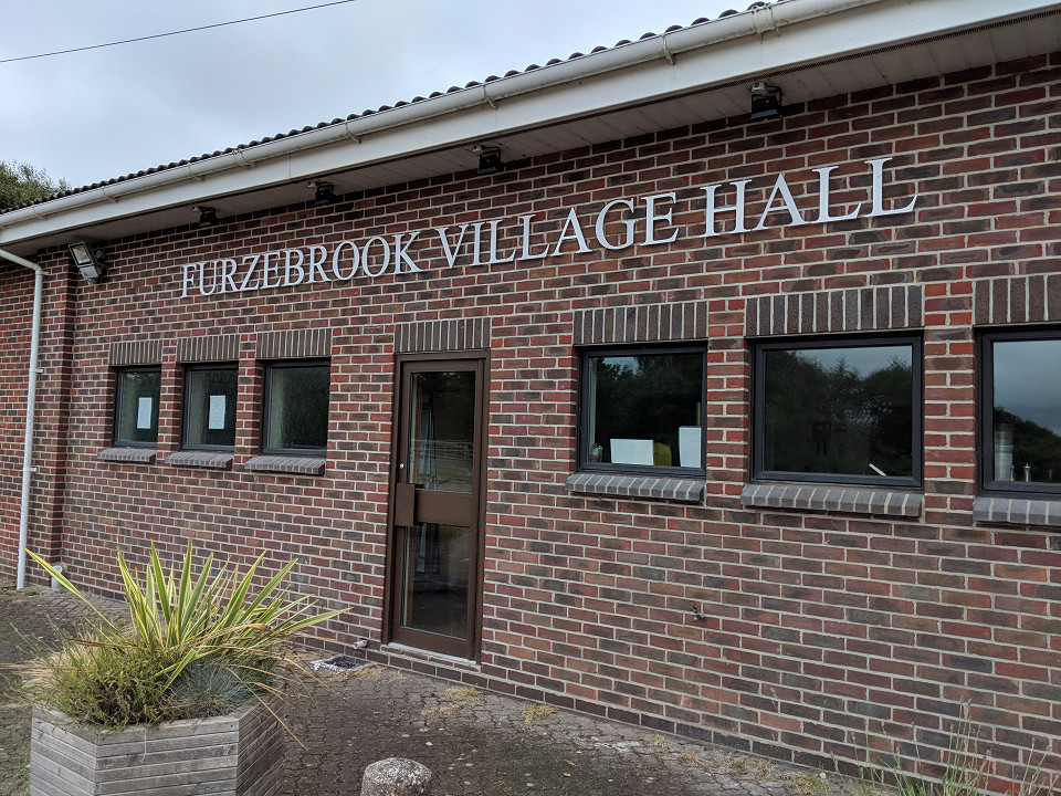 The hall from outside, with its sign